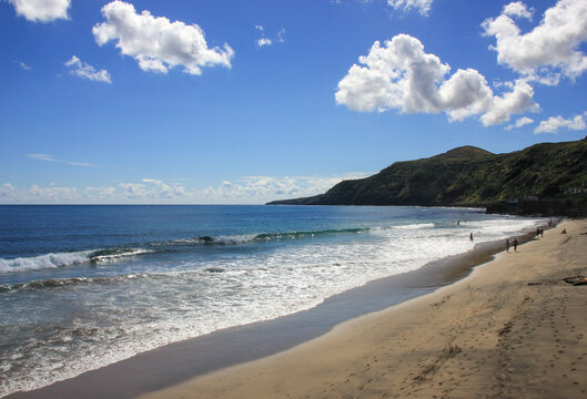 Breaking wave, light sand, Azores, Santa Maria island.