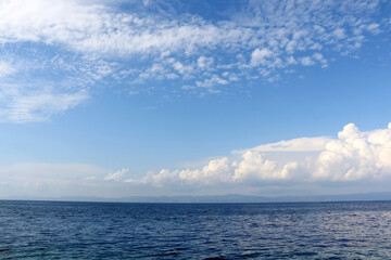 Fototapeta na wymiar Clouds over the sea. Beautiful landscape in Dalmatia, Croatia.