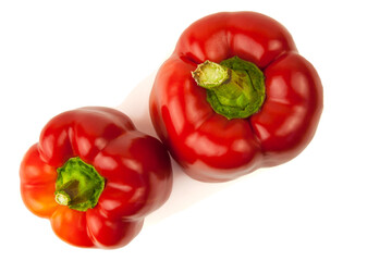 Two pieces of fresh red bell peppers isolated on a white background. Top view