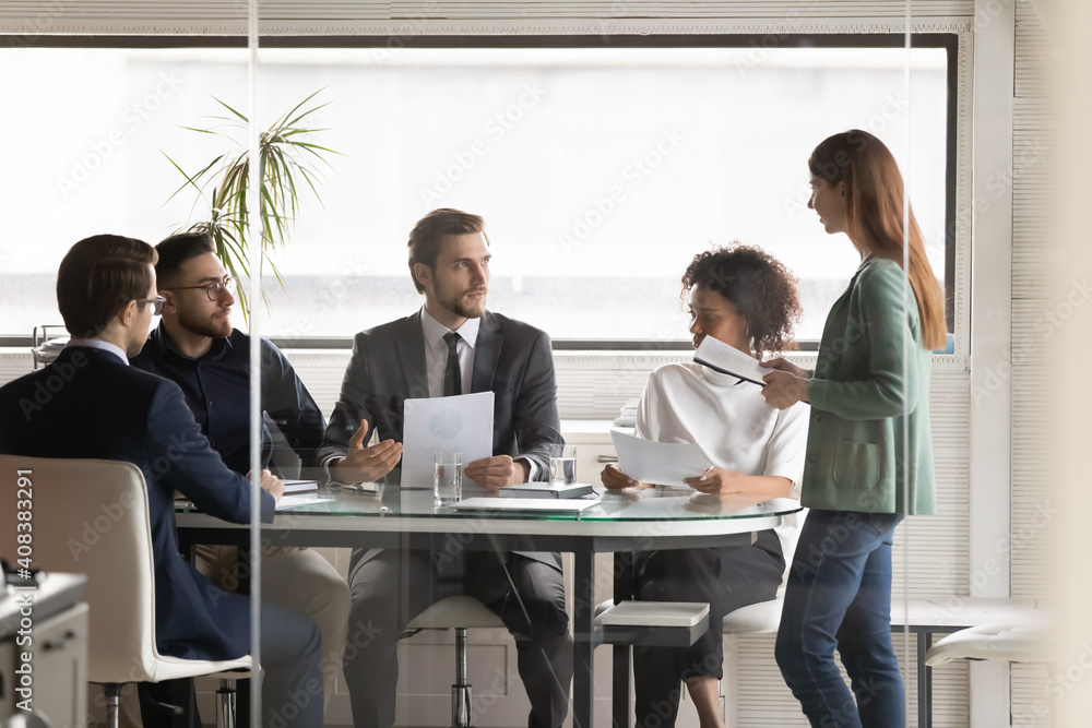 Canvas Prints businesswoman presenting financial project statistics to diverse colleagues at corporate briefing, s