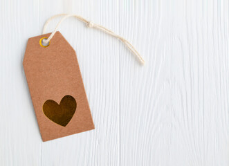 Craft label with a heart on a white background with space for text. Layout of a banner, poster for the holiday.