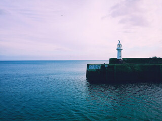 Fototapeta premium lighthouse on the coast of the sea