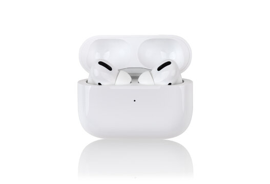 Rostov-on-Don, Russia - December 2019. Apple AirPods Pro on a white background. Wireless headphones in a charging case close-up.