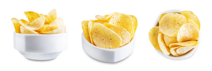 Yellow potato chips with salt and season on a white isolated background
