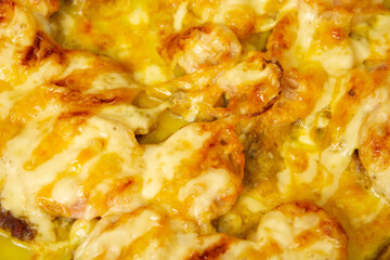 bolognese in baking dish with meat and melt cheese