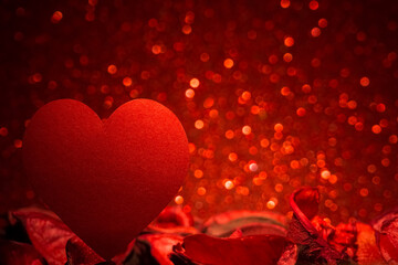 Valentine's day concept and background. Silhouette heart shape isolated on red bokeh background. 