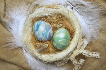 Ostara symbols. Colorized eggs in a nest.