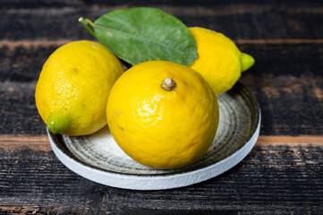 Fresh ripe bergamot orange fruits, fragrant citrus used in earl grey tea, medicine and spa treatments
