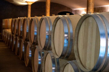 Cave with many  wine casks on wine domain in Cotes de Provence near Collobrieres , region Provence,...