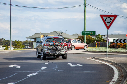 Cars driving around a roundabout