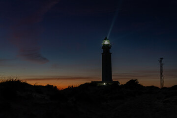 the Cape Trafalgar lighthouse signal light after sunset with colorful evening sky