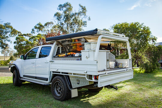 Tradies ute on property with kelpie dog sitting on tray
