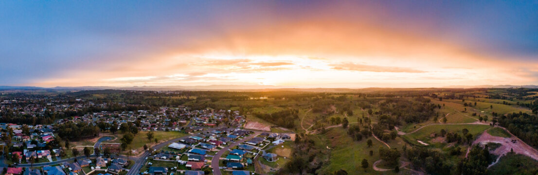 Panoramic view of clouds and light in sunset sky