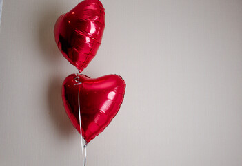 Red balloons in the shape of a heart.