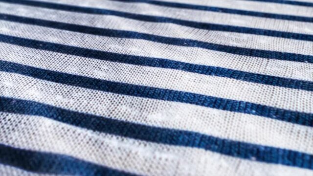 White and blue striped pattern texture background. Linen cotton macro shot, decorative woven.