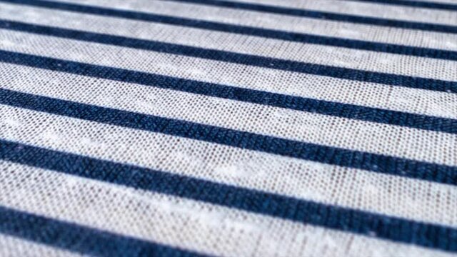 White and blue striped pattern texture background. Linen cotton macro shot, decorative woven.