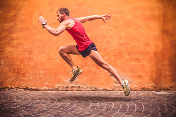 The sportsman starts running.  Sprinter, runner.