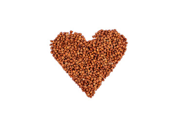 Buckwheat heart isolated on white background. Buckwheat in the shape of a heart. Photography for design. Valentines day concept