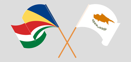 Crossed and waving flags of Seychelles and Cyprus