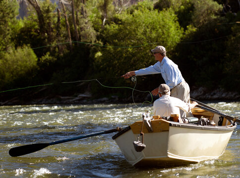 USA, Colorado, Pair of men fly-fishing