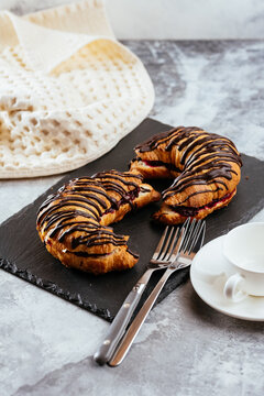 A variety of sweet homemade desserts on a light marble backgroun