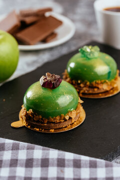 A variety of sweet homemade desserts on a light marble backgroun