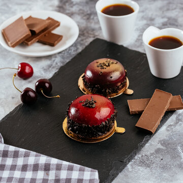 A variety of sweet homemade desserts on a light marble backgroun