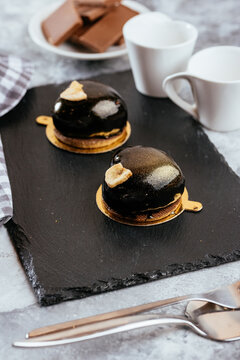 A variety of sweet homemade desserts on a light marble backgroun