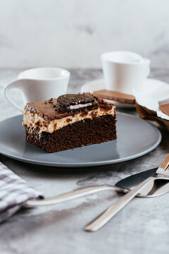 A variety of sweet homemade desserts on a light marble backgroun