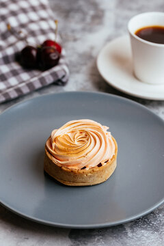A variety of sweet homemade desserts on a light marble backgroun