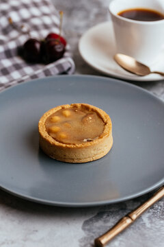 A variety of sweet homemade desserts on a light marble backgroun