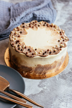 A variety of sweet homemade desserts on a light marble backgroun