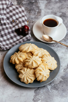A variety of sweet homemade desserts on a light marble backgroun