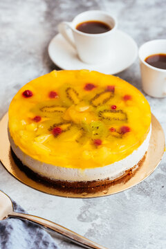 A variety of sweet homemade desserts on a light marble backgroun