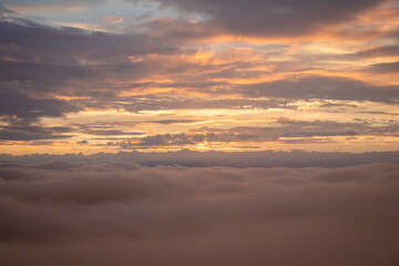 A Sunset Between the Clouds
