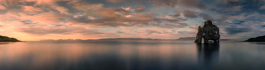 Panoramic view to sunset at the Hvitserkur basalt stack in northern Iceland