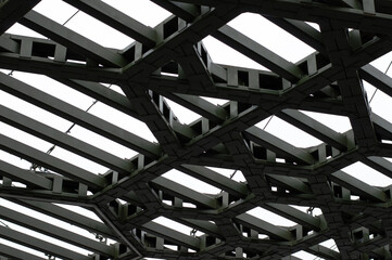 Metal roof structure in the park on a cloudy day.