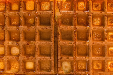 homemade belgian waffles, crispy waffles close-up on the table