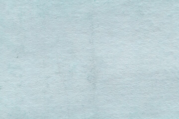 Cardboard blue abstract pattern texture close-up. Retro old paper background. Grunge concrete wall. Vintage blank wallpaper.