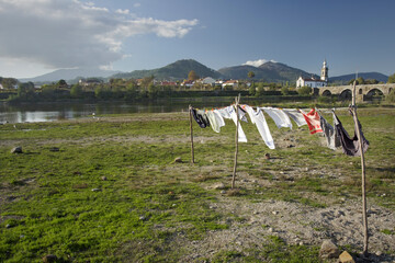 Clothes drying on the river banks