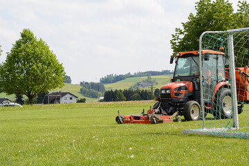 Sports Facility Is Mowed Lawn Tractor - Lawn Maintenance