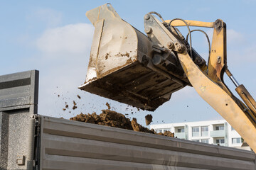 Excavation Tilts Earth Of Construction Loaders - Close-up
