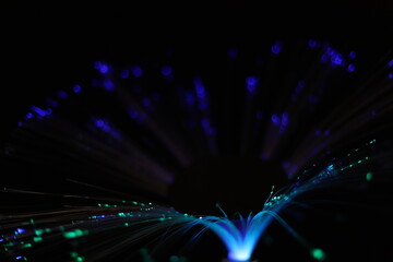 Bokeh of colorful, defocused lights and wires with black background. Fireworks, explosion of colorful lights.