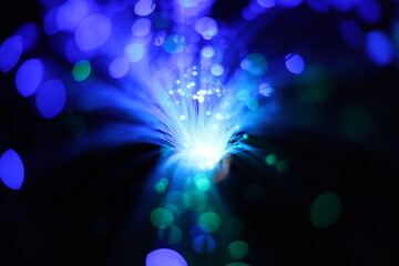 Bokeh of colorful, defocused lights and wires with black background. Fireworks, explosion of colorful lights.