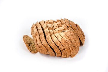 Sliced ketogenic bread made of oatmeal and coconut flour on a white background