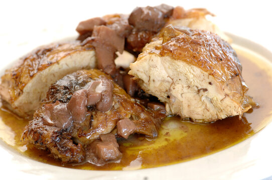 guinea fowl with mushrooms is a typical food of the Marche region and central Italy
