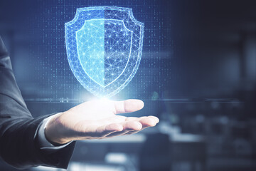 Hand holding creative digital shield