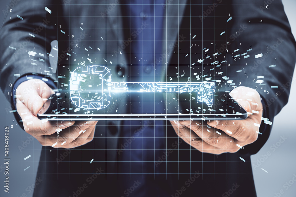 Poster businessman holding digital tablet computer with glowing circuit key
