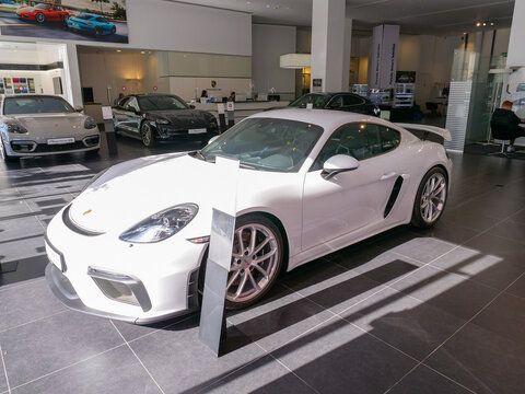 Porsche Showroom With Brand New Models And A White GTS.
