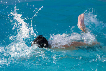 Boy Swimming in Pool 02